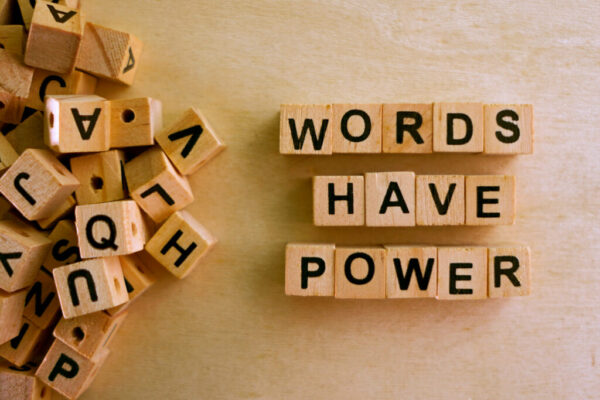 Words,Have,Power,Word,Cube,On,Wood,Background,,english,Language